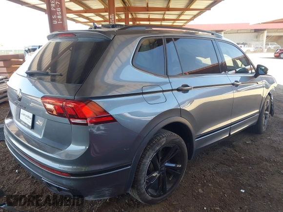 2024 Volkswagen Tiguan SE R-Line Black with VIN 3VVCB7AX4RM046261, listed as a IAAI auction lot 42327569 with 15,428 mi miles and . Bid and sale history available at DreamBid. Image 4.