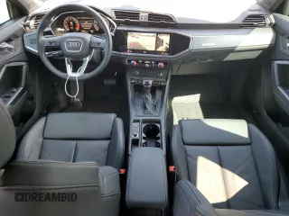 2023 Audi Q3 S line Premium Plus with VIN WA1EECF34P1117590, listed as a Copart auction lot 57404685 with 14,486 mi miles and Salvage title. Bid and sale history available at DreamBid. Image 8.