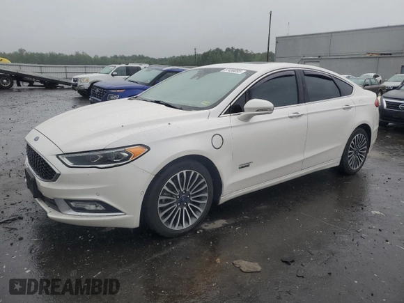 2017 Ford Fusion Titanium z VIN 3FA6P0SUXHR268559, wystawiony jako Copart lot #57456085 z przebiegiem 124 072 mil mil oraz Szkoda całkowita • Salvage title. Historia ofert i sprzedaży dostępna na DreamBid. Obrazek 1.