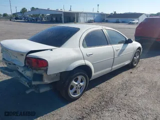 2005 Dodge Stratus Sdn SXT with VIN 1B3EL46X95N568803, listed as a IAAI auction lot 41467555 with 122,610 mi miles. Bid and sale history available at carsss.com. Image 4.