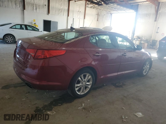 2012 Kia Optima EX with VIN 5XXGN4A77CG053039, listed as a Copart auction lot 48676705 with 114,501 mi miles and Salvage Title. Bid and sale history available at DreamBid. Image 3.