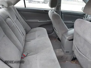 2002 Toyota Camry LE z VIN JTDBE32K720119418, wystawiony jako IAAI lot #42360721 z przebiegiem 235 678 mil mil oraz . Historia ofert i sprzedaży dostępna na DreamBid. Obrazek 8.