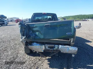 1999 Ford F-350 XL z VIN 1FTSW31F0XEE48747, wystawiony jako IAAI lot #39444054 z przebiegiem 283 371 mil mil oraz . Historia ofert i sprzedaży dostępna na DreamBid. Obrazek 16.