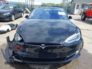 2017 Tesla Model S 60 z VIN 5YJSA1E13HF228486, wystawiony jako IAAI lot #42092686 z przebiegiem 78 089 mil mil oraz . Historia ofert i sprzedaży dostępna na DreamBid. Obrazek 12.