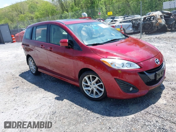 2012 Mazda 5 Grand Touring with VIN JM1CW2DL1C0123418, listed as a IAAI auction lot 42126956 with 112,411 mi miles and . Bid and sale history available at DreamBid. Image 1.