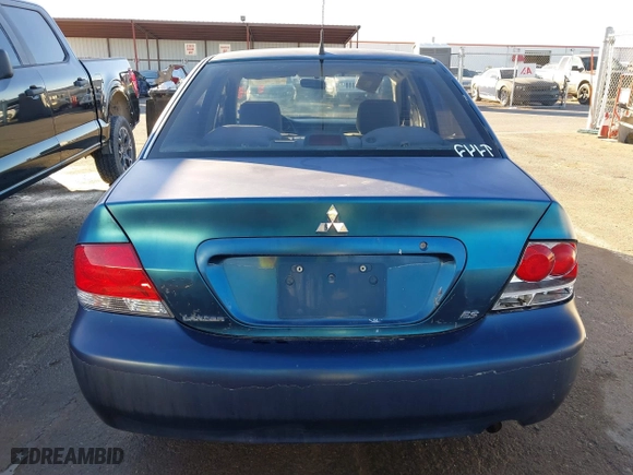 2005 Mitsubishi Lancer ES with VIN JA3AJ26E65U014838, listed as a IAAI auction lot 41310586 with 127,487 mi miles. Bid and sale history available at carsss.com. Image 16.