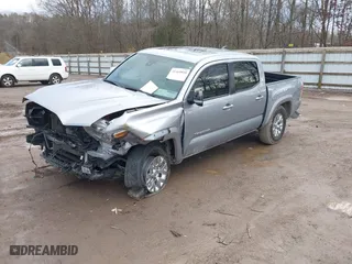 2019 Toyota Tacoma 4WD SR with VIN 3TMGZ5AN8KM259475, listed as a IAAI auction lot 41569810 with 61,405 mi miles. Bid and sale history available at carsss.com. Image 17.