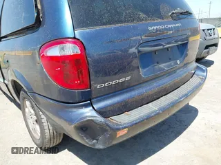 2002 Dodge Caravan EX z VIN 2B8GP74L92R529717, wystawiony jako IAAI lot #42478226 z przebiegiem Nie podano mil oraz . Historia ofert i sprzedaży dostępna na DreamBid. Obrazek 11.
