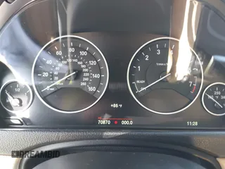 2015 BMW 4 Series 428i xDrive with VIN WBA4C9C56FG135520, listed as a IAAI auction lot 41574336 with 70,870 mi miles and . Bid and sale history available at carsss.com. Image 7.