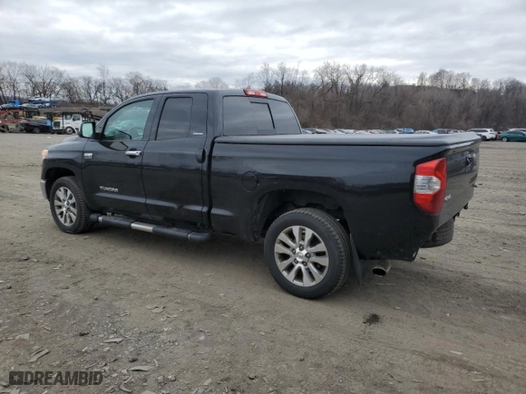 2014 Toyota Tundra 4WD Truck LTD with VIN 5TFBY5F11EX333546, listed as a Copart auction lot 87825555 with 244,592 mi miles and Salvage Title. Bid and sale history available at carsss.com. Image 2.