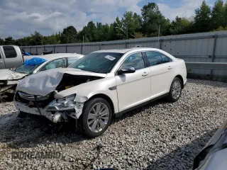 2012 Ford Taurus Limited with VIN 1FAHP2JW1CG141710, listed as a Copart auction lot 72746064 with 206,760 mi miles and Salvage title. Bid and sale history available at DreamBid. Image 1.