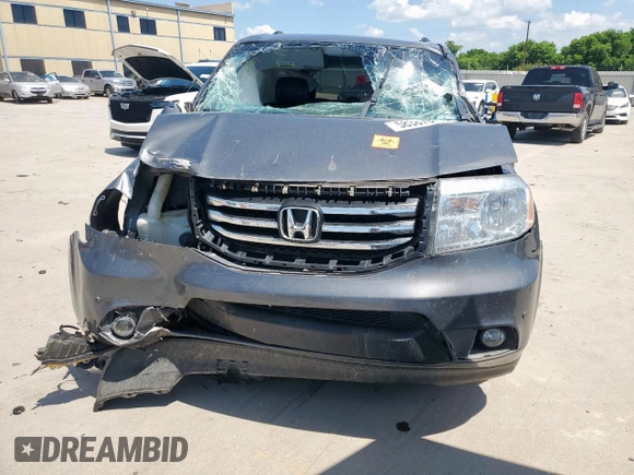 2013 Honda Pilot Touring z VIN 5FNYF3H97DB032389, wystawiony jako Copart lot #58387645 z przebiegiem Nie podano mil oraz Szkoda całkowita • Salvage title. Historia ofert i sprzedaży dostępna na DreamBid. Obrazek 5.