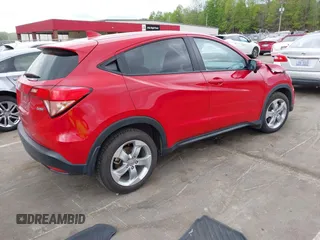 2016 Honda HR-V EX with VIN 3CZRU5H59GM744299, listed as a IAAI auction lot 42041596 with 73,949 mi miles. Bid and sale history available at carsss.com. Image 4.