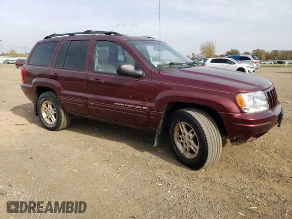 1999 Jeep Grand Cherokee Limited with VIN 1J4GW68S5XC573162, listed as a Copart auction lot 78611274 with 174,960 mi miles and Salvage Title. Bid and sale history available at carsss.com. Image 4.
