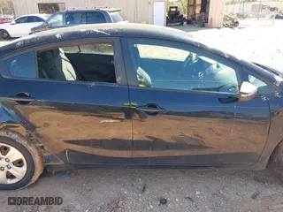 2015 Kia Forte LX with VIN KNAFX4A69F5268750, listed as a IAAI auction lot 41733802 with 234,049 mi miles. Bid and sale history available at carsss.com. Image 13.