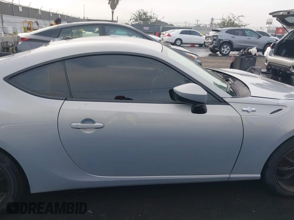 2013 Scion FR-S with VIN JF1ZNAA1XD1729862, listed as a IAAI auction lot 41143862 with 64,208 mi miles. Bid and sale history available at carsss.com. Image 13.