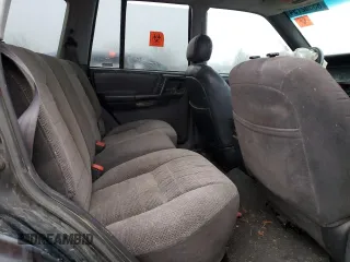 1998 Jeep Grand Cherokee Laredo with VIN 1J4GZ48S0WC171138, listed as a Copart auction lot 85502794 with 0 mi miles and Salvage Title. Bid and sale history available at carsss.com. Image 12.
