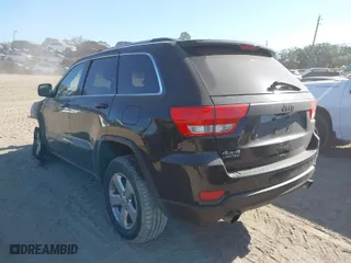 2013 Jeep Grand Cherokee Limited with VIN 1C4RJFBTXDC575676, listed as a IAAI auction lot 41174929 with 1 mi miles. Bid and sale history available at carsss.com. Image 3.