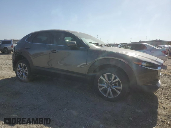 2021 Mazda CX-30 Preferred with VIN 3MVDMBCL6MM214077, listed as a Copart auction lot 59145625 with 37,232 mi miles and Salvage title. Bid and sale history available at DreamBid. Image 4.