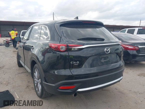 2023 Mazda CX-9 Grand Touring with VIN JM3TCBDY2P0632239, listed as a IAAI auction lot 41543302 with 56,603 mi miles and . Bid and sale history available at carsss.com. Image 3.