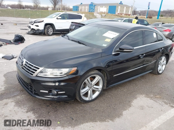 2014 Volkswagen CC R-Line with VIN WVWBN7ANXEE521055, listed as a IAAI auction lot 41197539 with 94,902 mi miles. Bid and sale history available at carsss.com. Image 2.