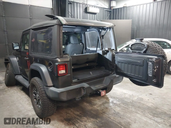 2021 Jeep Wrangler Sport S with VIN 1C4HJXAG2MW502452, listed as a IAAI auction lot 42031159 with 87,952 mi miles and . Bid and sale history available at DreamBid. Image 3.