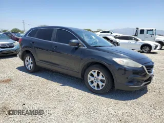2015 Mazda CX-9 Touring with VIN JM3TB2CV2F0456723, listed as a Copart auction lot 57905015 with 113,189 mi miles and Salvage title. Bid and sale history available at DreamBid. Image 4.