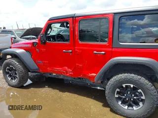 2024 Jeep Wrangler Rubicon with VIN 1C4RJXR60RW292120, listed as a IAAI auction lot 42613719 with 31,286 mi miles and . Bid and sale history available at DreamBid. Image 14.