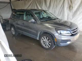 2014 Volkswagen Tiguan SEL with VIN WVGBV3AX2EW541476, listed as a Copart auction lot 64817795 with 158,032 mi miles and Salvage title. Bid and sale history available at DreamBid. Image 4.