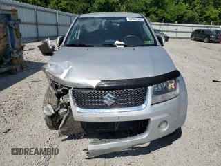 2011 Suzuki Grand Vitara Premium z VIN JS3TD0D29B4103041, wystawiony jako Copart lot #62066985 z przebiegiem 219 727 mil mil oraz Szkoda całkowita • Salvage title. Historia ofert i sprzedaży dostępna na DreamBid. Obrazek 5.