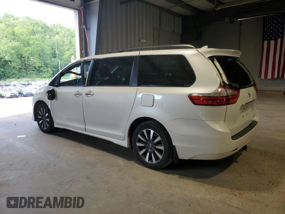 2018 Toyota Sienna XLE with VIN 5TDDZ3DC9JS204307, listed as a Copart auction lot 57327715 with 70,886 mi miles and Salvage title. Bid and sale history available at DreamBid. Image 2.
