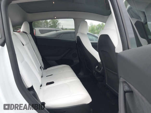 2024 Tesla Model Y Long Range with VIN 7SAYGAEE2RF014315, listed as a IAAI auction lot 42053183 with 36,521 mi miles and . Bid and sale history available at DreamBid. Image 8.
