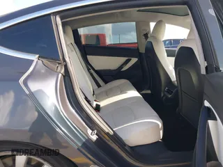 2020 Tesla Model 3 Standard Range Plus with VIN 5YJ3E1EA0LF744046, listed as a IAAI auction lot 41939894 with 102,576 mi miles. Bid and sale history available at carsss.com. Image 8.
