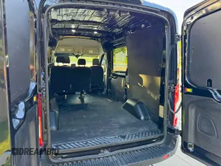 2023 Ford Transit Cargo with VIN 1FTYE1C87PKA24984, listed as a Copart auction lot 65462015 with 36,515 mi miles and Clean title. Bid and sale history available at DreamBid. Image 11.