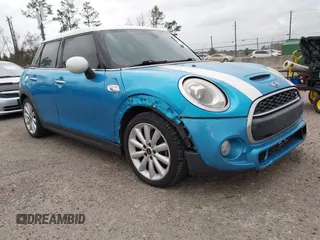 2017 MINI Hardtop 4 Door Cooper S z VIN WMWXU3C37H2F48944, wystawiony jako IAAI lot #41732140 z przebiegiem 154 563 mil mil oraz . Historia ofert i sprzedaży dostępna na DreamBid. Obrazek 1.