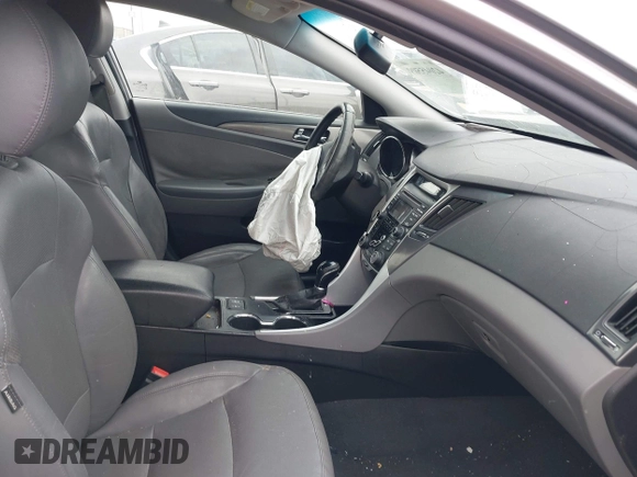 2012 Hyundai Sonata Hybrid with VIN KMHEC4A45CA054605, listed as a IAAI auction lot 42045509 with 188,852 mi miles and . Bid and sale history available at DreamBid. Image 5.