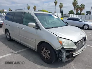 2005 Honda Odyssey EX-L with VIN 5FNRL38745B075486, listed as a IAAI auction lot 42080772 with 197,158 mi miles and . Bid and sale history available at DreamBid. Image 1.
