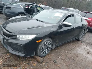 2019 Honda Civic Hatchback LX with VIN SHHFK7H39KU221921, listed as a IAAI auction lot 41556403 with 73,852 mi miles. Bid and sale history available at carsss.com. Image 20.