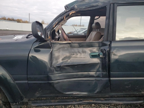 1996 Toyota Land Cruiser with VIN JT3HJ85JXT0142784, listed as a Copart auction lot 81755434 with 370,361 mi miles and Salvage Title. Bid and sale history available at carsss.com. Image 7.