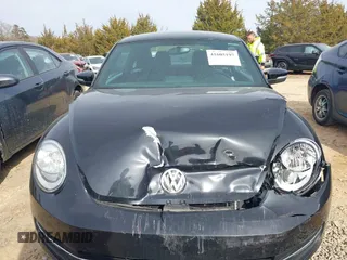 2012 Volkswagen Beetle 2.0T Turbo w/Sun/Snd/Nav PZEV with VIN 3VWVA7AT4CM655068, listed as a IAAI auction lot 41605197 with 115,546 mi miles. Bid and sale history available at carsss.com. Image 12.