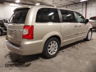 2014 Chrysler Town & Country Touring with VIN 2C4RC1BG2ER422914, listed as a IAAI auction lot 42017742 with 49,856 mi miles and . Bid and sale history available at DreamBid. Image 4.