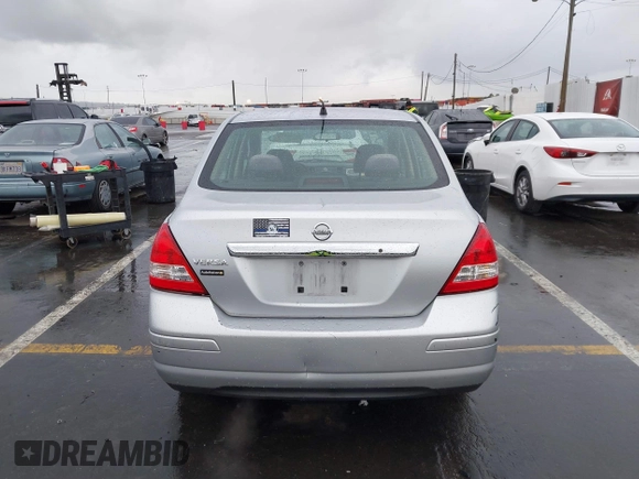 2009 Nissan Versa S with VIN 3N1BC11E39L364397, listed as a IAAI auction lot 41788772 with 223,959 mi miles and . Bid and sale history available at DreamBid. Image 16.