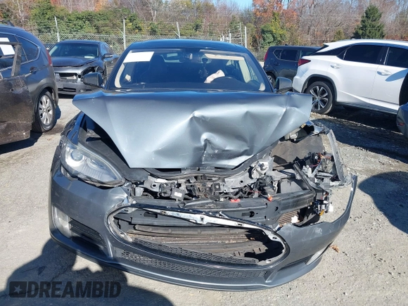 2013 Tesla Model S Performance with VIN 5YJSA1DP7DFP11737, listed as a IAAI auction lot 40915195 with Not provided miles and . Bid and sale history available at DreamBid. Image 11.