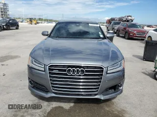 2018 Audi A8 z VIN WAU44AFD0JN000586, wystawiony jako Copart lot #73373174 z przebiegiem 45 183 mil mil oraz Szkoda całkowita • Salvage title. Historia ofert i sprzedaży dostępna na DreamBid. Obrazek 5.