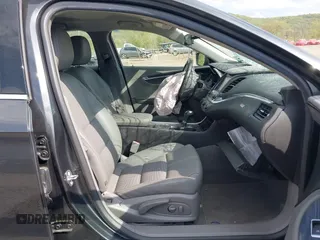 2018 Chevrolet Impala LT with VIN 2G1105S38J9147336, listed as a IAAI auction lot 42146904 with 76,959 mi miles and . Bid and sale history available at DreamBid. Image 5.