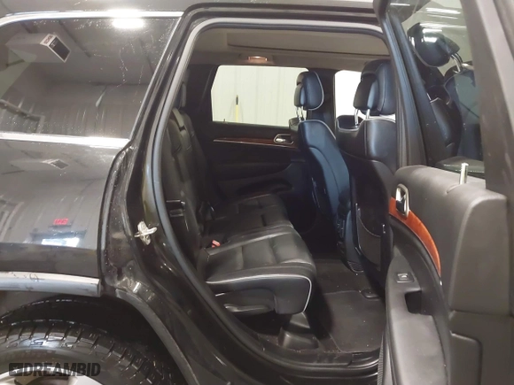 2011 Jeep Grand Cherokee Overland with VIN 1J4RR6GT7BC607735, listed as a IAAI auction lot 41830669 with 98,161 mi miles. Bid and sale history available at carsss.com. Image 8.