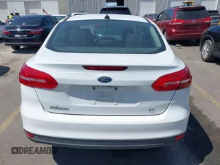 2017 Ford Focus SE with VIN 1FADP3F24HL232527, listed as a IAAI auction lot 42110702 with 95,327 mi miles and . Bid and sale history available at DreamBid. Image 17.