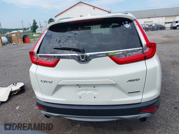 2018 Honda CR-V Touring with VIN 2HKRW2H91JH665241, listed as a IAAI auction lot 42638694 with 62,066 mi miles and . Bid and sale history available at DreamBid. Image 16.