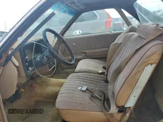 1978 Chevrolet El Camino z VIN 1W80L8Z444623, wystawiony jako Copart lot #76858374 z przebiegiem Nie podano mil oraz Szkoda całkowita • Salvage title. Historia ofert i sprzedaży dostępna na DreamBid. Obrazek 7.