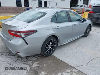 2023 Toyota Camry SE with VIN 4T1G11AK4PU736195, listed as a IAAI auction lot 42152170 with 54,465 mi miles. Bid and sale history available at carsss.com. Image 4.